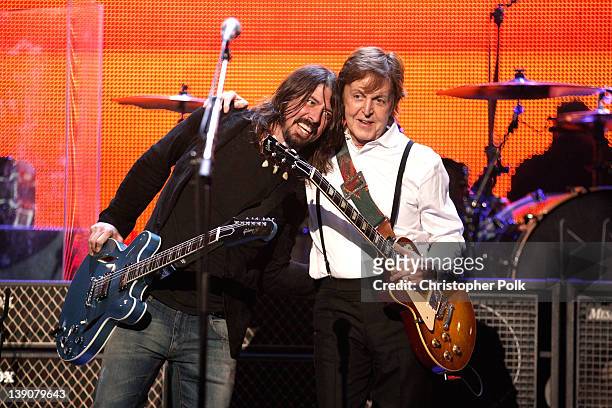Musician Dave Grohl of the Foo Fighters and honoree Sir Paul McCartney perform onstage during The 2012 MusiCares Person Of The Year Gala Honoring...