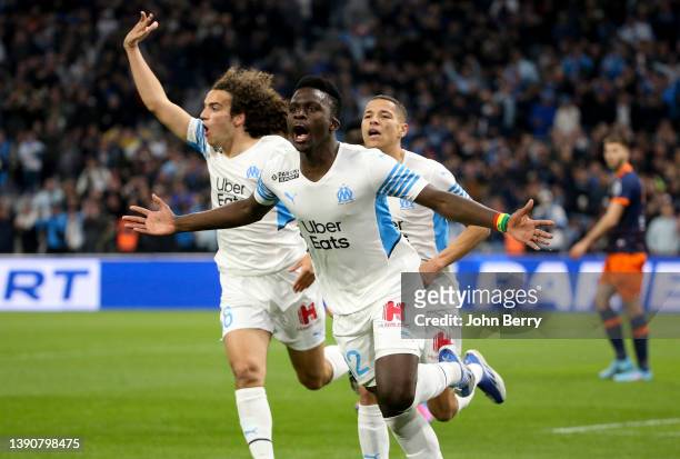 Bamba Dieng of Marseille celebrates his goal with Matteo Guendouzi, Amine Harit of Marseille during the Ligue 1 Uber Eats match between Olympique de...