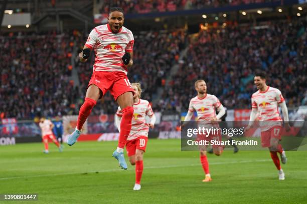 Christopher Nkunku of RB Leipzig celebrates after scoring their side's first goal during the Bundesliga match between RB Leipzig and TSG Hoffenheim...