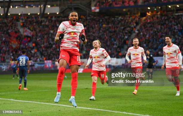 Christopher Nkunku of RB Leipzig celebrates after scoring their side's first goal during the Bundesliga match between RB Leipzig and TSG Hoffenheim...