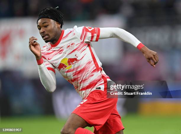 Mohamed Simakan of RB Leipzig in action during the Bundesliga match between RB Leipzig and TSG Hoffenheim at Red Bull Arena on April 10, 2022 in...