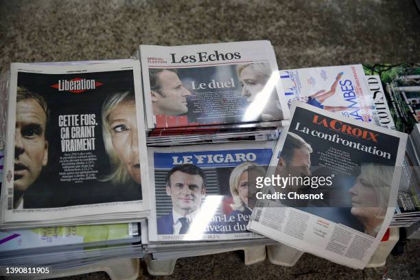 The front pages of the French newspapers, Liberation, Les Echos, La Croix and Le Figaro are displayed in a newsstand with the photos of Emmanuel...