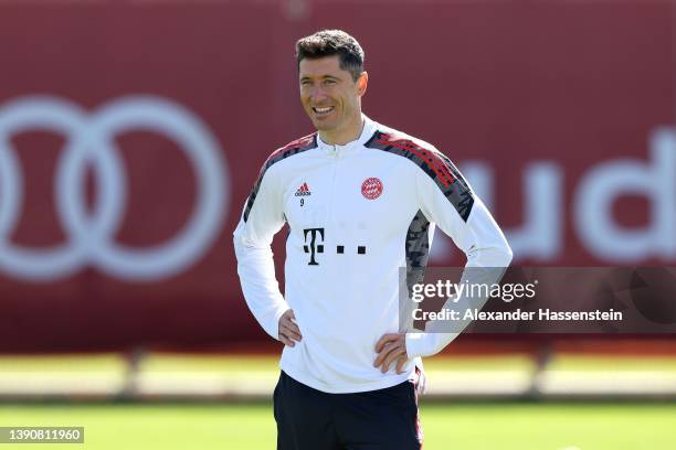 Robert Lewandowski of FC Bayern München looks on during a training session at Saebener Strasse training ground on April 11, 2022 in Munich, Germany....