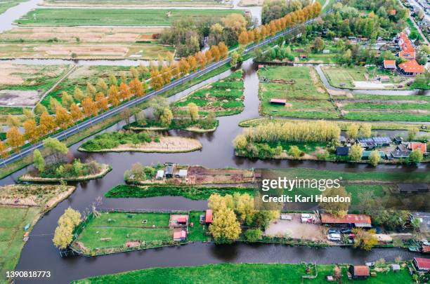 an aerial view of marshland in zaandam, the netherlands - watershed 2017 stock pictures, royalty-free photos & images