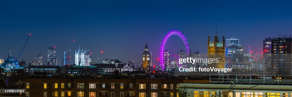 Londoner Sehenswürdigkeiten Westminster Abbey Big Ben Parlament beleuchtete Nacht Dächer Panorama