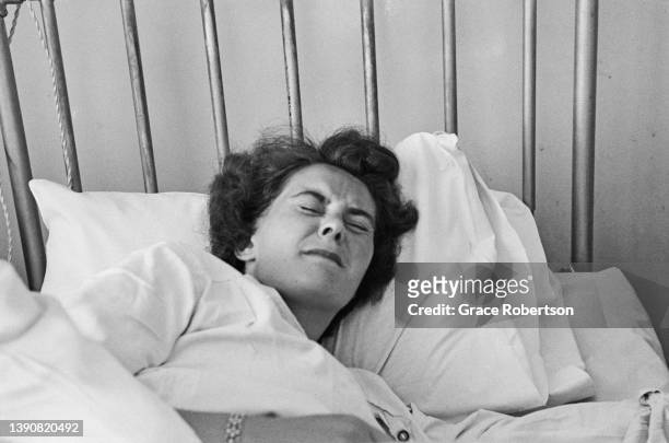 Pregnant woman in pain during labor, UK, 1956. Original Publication: Picture Post - 9111 - Analgesia - unpub.
