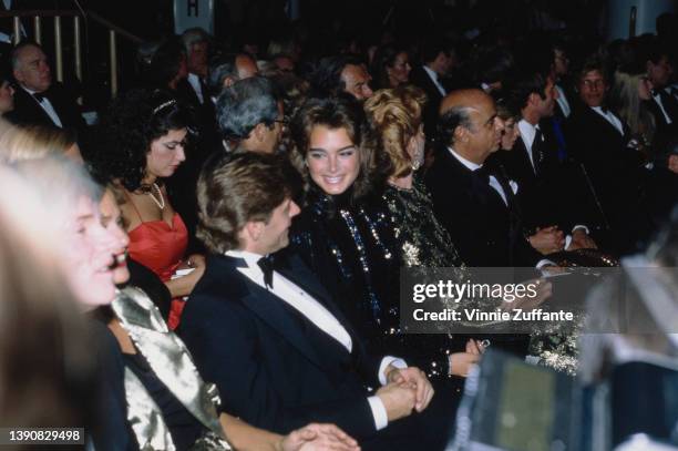 American artist Andy Warhol , American model and actress Lauren Hutton , Soviet-born Latvian-American dancer, choreographer and actor Mikhail...