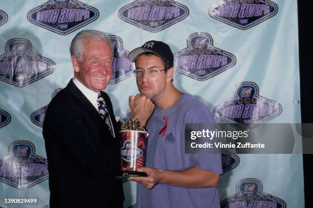 American television personality Bob Barker and American actor and comedian Adam Sandler attend the 5th Annual MTV Movie Awards, held at Walt Disney...