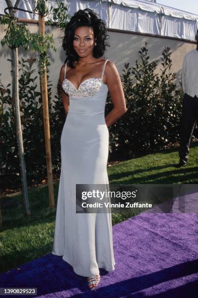 American actress Lela Rochon, wearing a pale blue evening dress, attends the 1996 MTV Movie Awards, held at Walt Disney Studios in Burbank,...