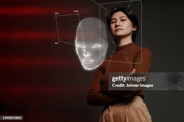 3d face mapping of young woman - facial recognition technology stock-fotos und bilder