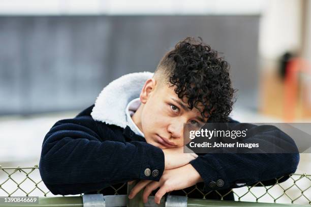 teenage boy looking at camera - male victim stock pictures, royalty-free photos & images