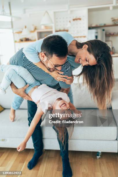 family fun - holding upside down stock pictures, royalty-free photos & images
