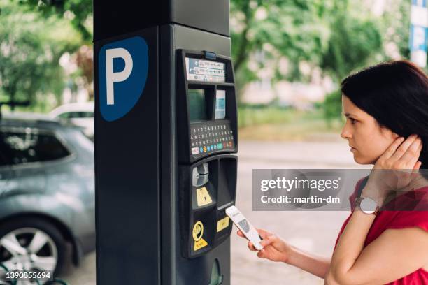 contactless payment for parking place in the city - near field communication stock pictures, royalty-free photos & images