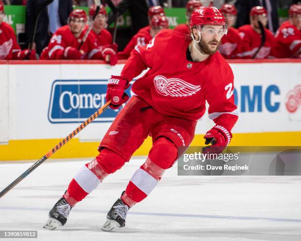 Michael Rasmussen of the Detroit Red Wings turns up ice against the Columbus Blue Jackets during the third period of an NHL game at Little Caesars...