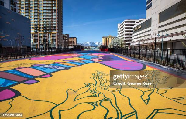 Colorful art covers a roof cover over the Union Pacific railroad tracks through downtown as viewed on April 2 in Reno, Nevada. Reno, located in the...