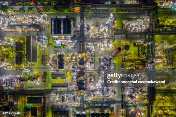 shot from drone night of oil refinery thailand. - refinery stock pictures, royalty-free photos & images