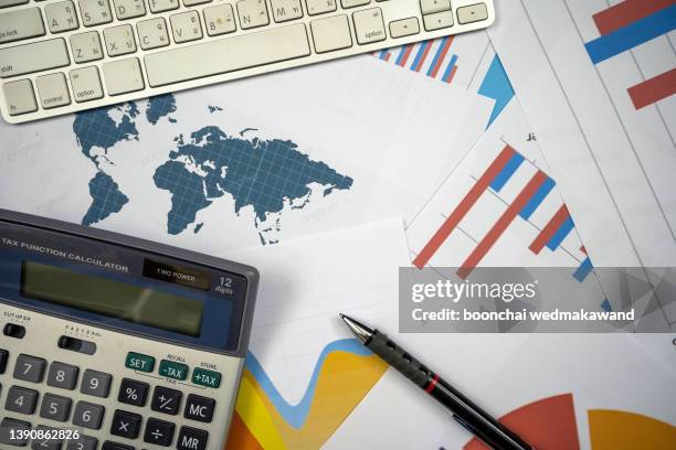 calculator, pen and summary report. paperwork.business planning and management concept. - 401k statement stock pictures, royalty-free photos & images