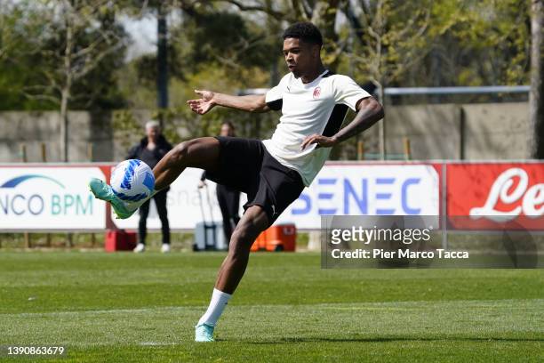 Emil Roback shoots the ball during an AC Milan training session at Milanello on April 11, 2022 in Cairate, Italy.