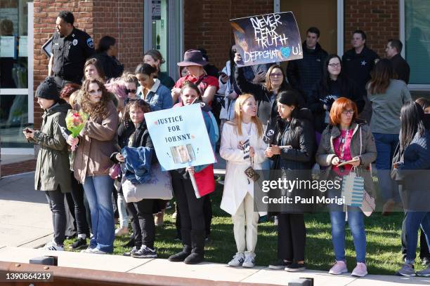 Spectators showing support for Johnny Depp And Amber Heard outside of Fairfax County Circuit Court on April 11, 2022 in Fairfax, Virginia. Depp is...