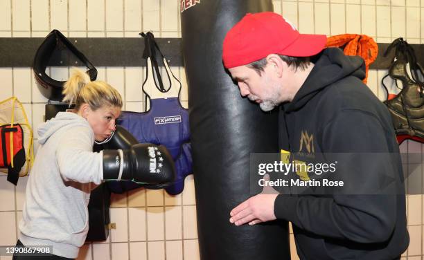 German featherweight boxer Nina Meinke train with coach Kay Huste at the Fleischfabrik on April 11, 2022 in Berlin, Germany.