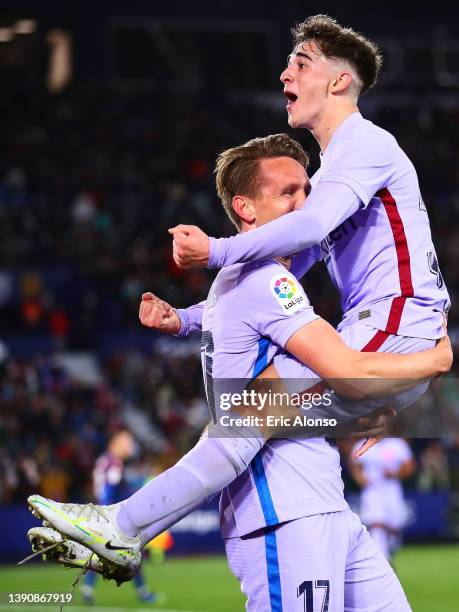 Luuk de Jong of FC Barcelona celebrates scoring his side's 3rd goal with his team mates during the La Liga Santander match between Levante UD and FC...