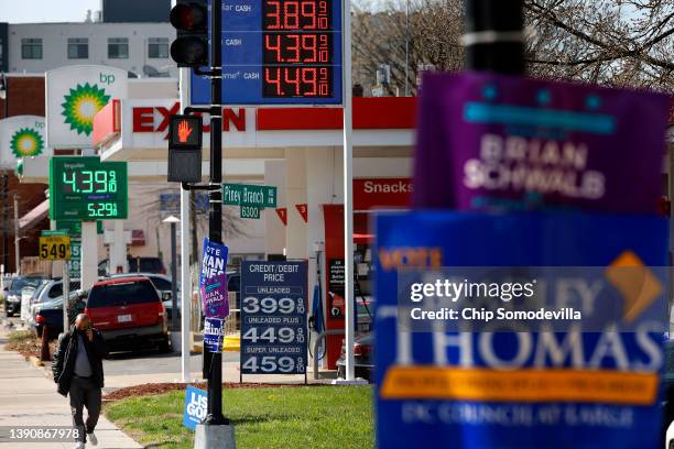 Gasoline prices hover around $4.00 a gallon for the least expensive grade at several gas stations in the nation's capital on April 11, 2022 in...