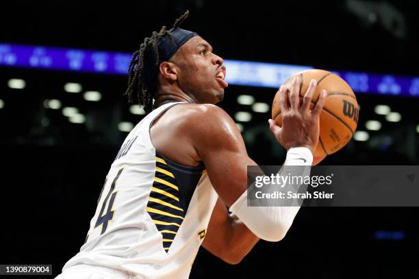 Buddy Hield of the Indiana Pacers shoots the ball during the second half against the Brooklyn Nets at Barclays Center on April 10, 2022 in the...