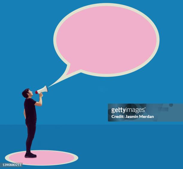 teenager with megaphone and speech bubble - holding speech bubble stock pictures, royalty-free photos & images