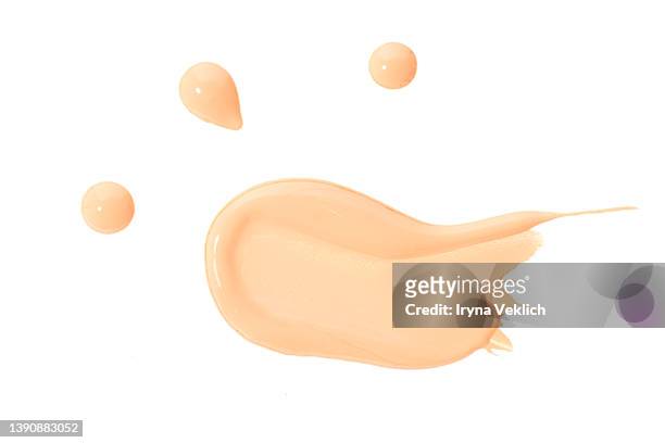 smears of thick make-up  face foundation  on white background. - make up liquid stock pictures, royalty-free photos & images