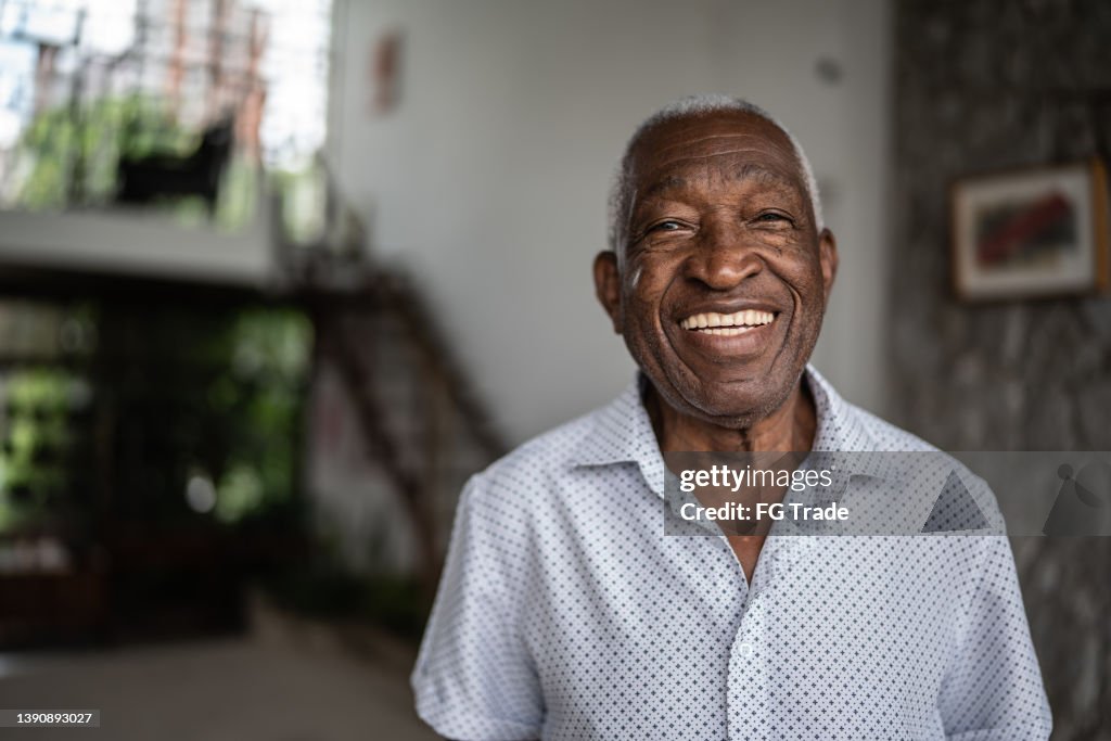 Portrait of a senior man at home