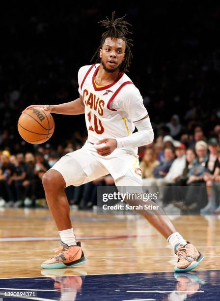 Darius Garland of the Cleveland Cavaliers dribbles during the second half against the Brooklyn Nets at Barclays Center on April 08, 2022 in the...