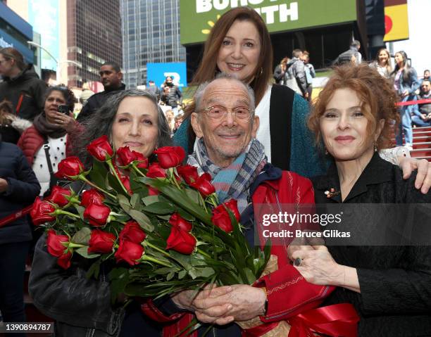 Bebe Neuwirth, Joel Grey, Donna Murphy and Bernadette Peters pose at Joel Grey's 90th birthday celebration at Times Square TKTS Red Steps on April...