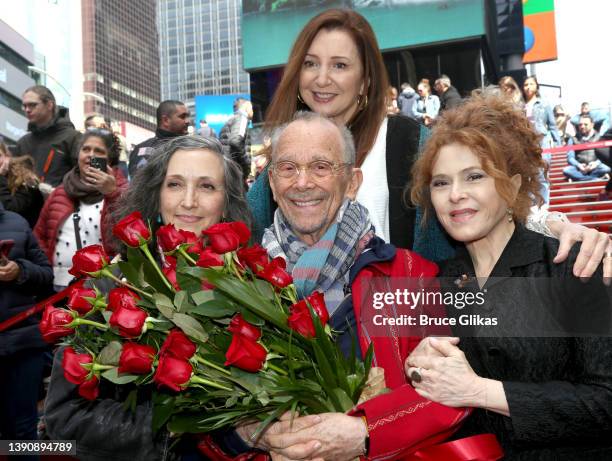 Bebe Neuwirth, Joel Grey, Donna Murphy and Bernadette Peters pose at Joel Grey's 90th birthday celebration at Times Square TKTS Red Steps on April...