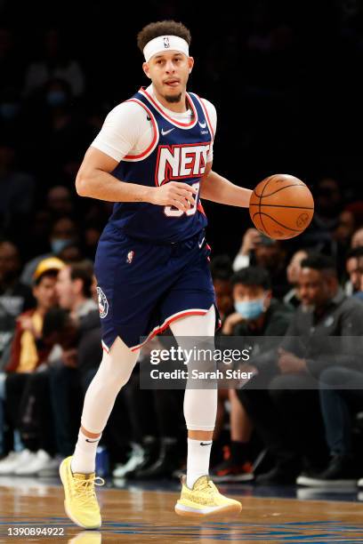 Seth Curry of the Brooklyn Nets dribbles during the first half against the Cleveland Cavaliers at Barclays Center on April 08, 2022 in the Brooklyn...