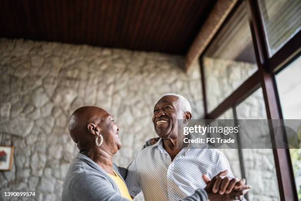 happy senior couple dancing at home - free pictures ballroom dancing stock pictures, royalty-free photos & images