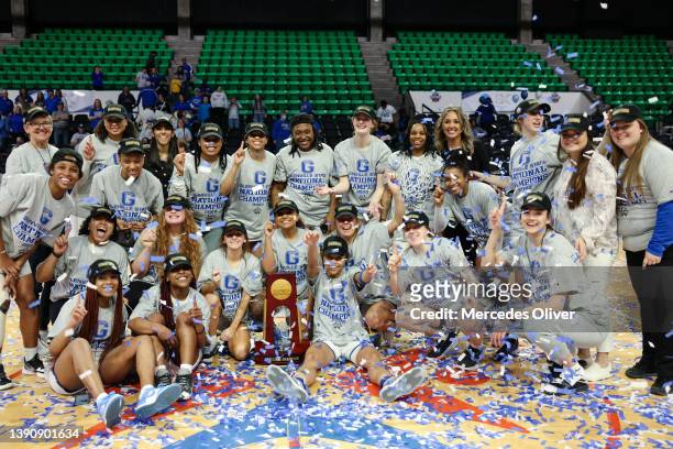 The Glenville State Pioneers celebrate after defeating the Western Washington Vikings to win the Division II Women's Basketball Championship held at...