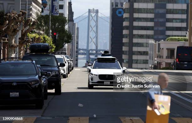 Waymo autonomous vehicle drives along California Street on April 11, 2022 in San Francisco, California. San Francisco is serving as testing grounds...