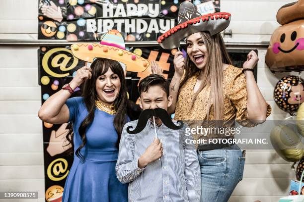 latin family portrait at the fiesta birthday party - sombrero stock pictures, royalty-free photos & images