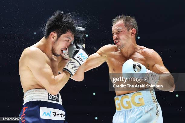 Gennadiy Golovkin of Kazakhstan connects his right on Ryota Murata of Japan exchange punches in the 5th round during the IBF & WBA Middleweight title...