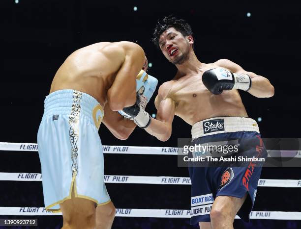 Ryota Murata of Japan connects his right on Gennadiy Golovkin of Kazakhstan in the 6 round during the IBF & WBA Middleweight title bout at Saitama...