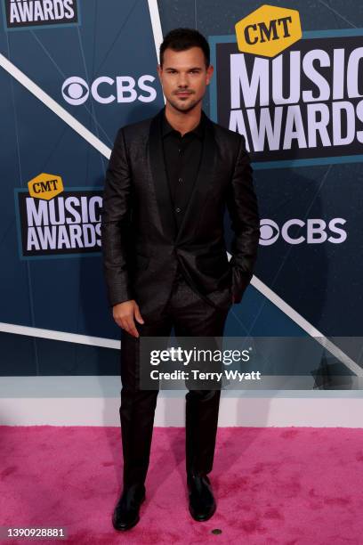 Taylor Lautner attends the 2022 CMT Music Awards at Nashville Municipal Auditorium on April 11, 2022 in Nashville, Tennessee.