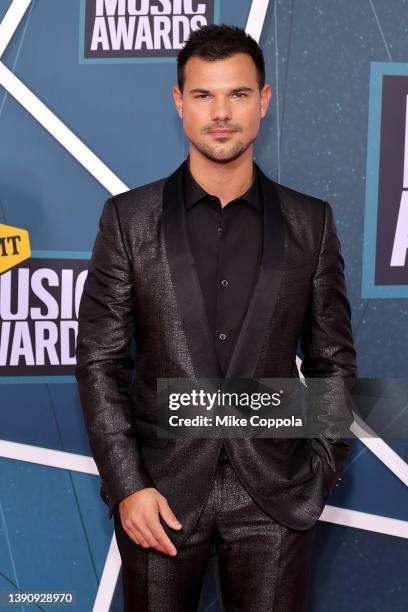 Taylor Lautner attends the 2022 CMT Music Awards at Nashville Municipal Auditorium on April 11, 2022 in Nashville, Tennessee.