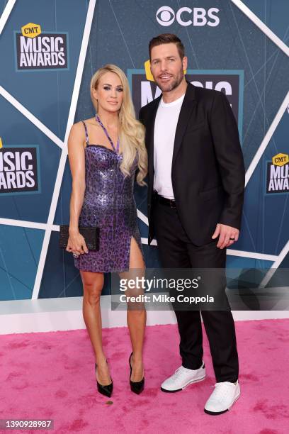 Carrie Underwood and Mike Fisher attend the 2022 CMT Music Awards at Nashville Municipal Auditorium on April 11, 2022 in Nashville, Tennessee.