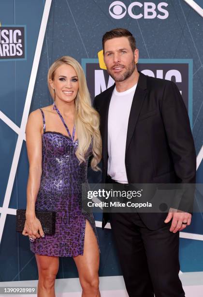 Carrie Underwood and Mike Fisher attend the 2022 CMT Music Awards at Nashville Municipal Auditorium on April 11, 2022 in Nashville, Tennessee.