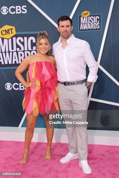Tenille Arts and Tyler Corrado attend the 2022 CMT Music Awards at Nashville Municipal Auditorium on April 11, 2022 in Nashville, Tennessee.