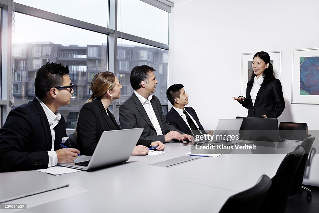 Businesswoman explaning at a meeting