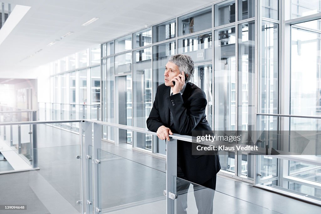 Businessman talking on smartphone