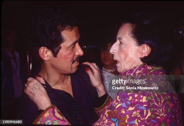 View of Japanese fashion designer Issey Miyake and French-born American fashion editor Diana Vreeland as they talk at Studio 54, New York, New York,...