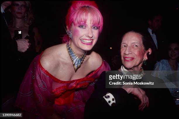 English fashion designer Zandra Rhodes and French-born American fashion editor Diana Vreeland pose together as they attend the Costume Institute Gala...