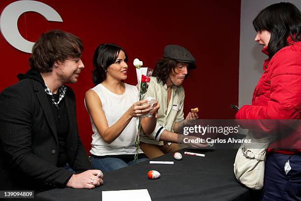 David Feito, singer Raquel del Rosario and Juan Luis Suarez, members of "El sueno de Morfeo" after their concert at FNAC Callao on February 16, 2012...